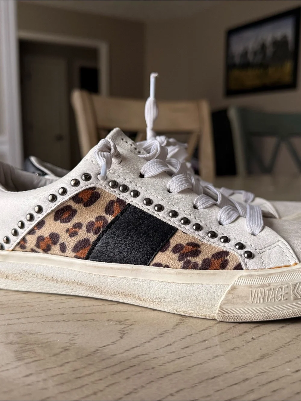 White Leather Women's Sneaker with Leopard Accent and Stud Detailing